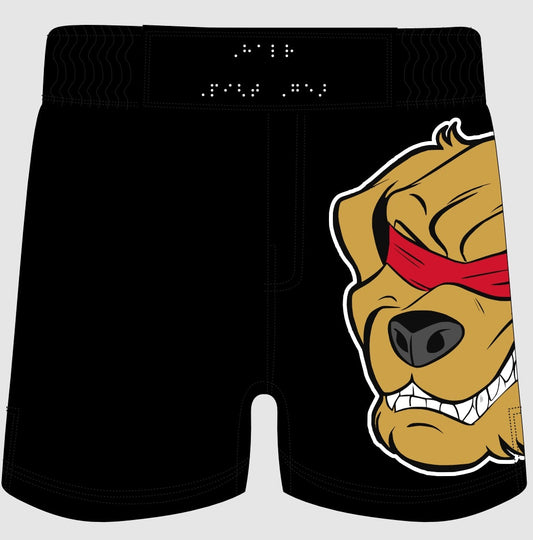 The image shows a pair of black cross-trainer shorts with the Halo Fight Gear logo on the right side. The logo features a fierce golden retriever with bared teeth, wearing a red blindfold. The waistband is adorned with Braille text that reads "Halo Fight Gear."